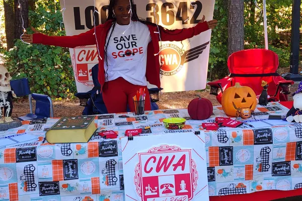 CWA member with a Save Our Scope tshirt